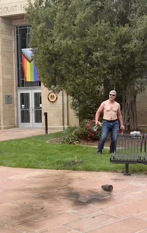This video still shows Mohammed Sabry Soliman holding Molotov cocktails in front of the Boulder County Courthouse on the Pearl Street Mall in Boulder on Sunday, June 1, 2025. Soliman is accused of injuring 12 people on Boulder's Pearl Street Mall with a "makeshift flamethrower" and Molotov cocktails, spending more than a year planning the "targeted act of violence" against a group calling for the release of Israeli hostages in Gaza, law enforcement officials said Monday. (Video still via Brian Horwitz)